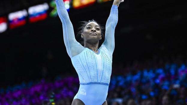 Biles makes history on World Championships return