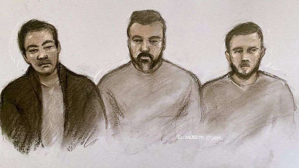 Three charged with aiding Hong Kong intelligence service