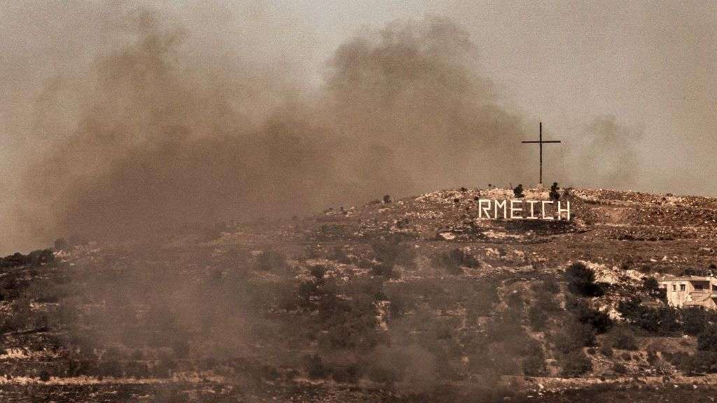 Residents of Lebanese border town 'determined to stay' as rockets fly above