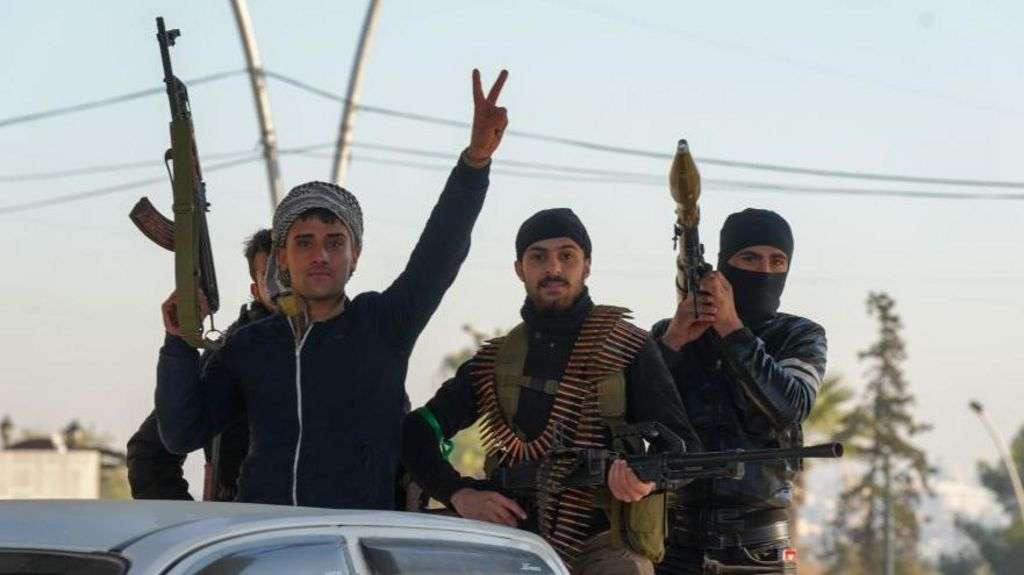 Who are the rebels seizing control of Syria's second city?