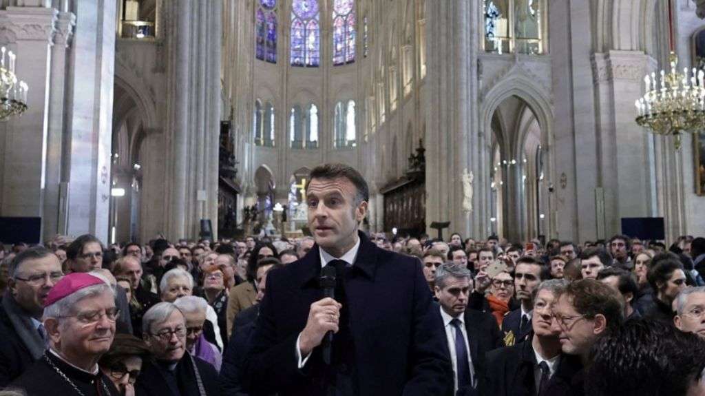 Embattled Macron seeks boost from Notre Dame reopening