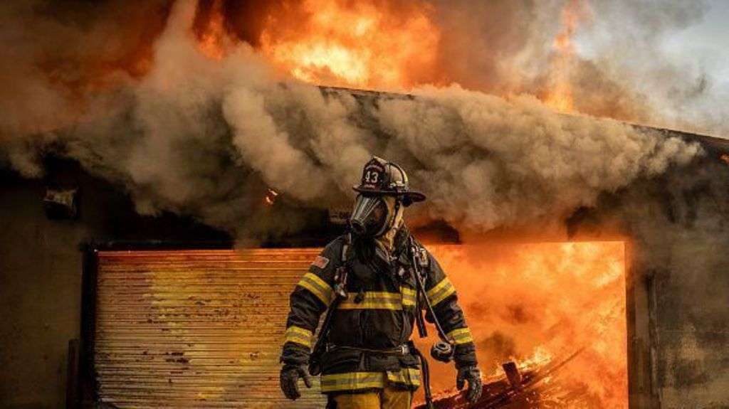 What's the latest on the Los Angeles wildfires and what caused them?